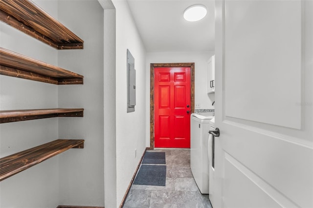 interior space with electric panel and separate washer and dryer