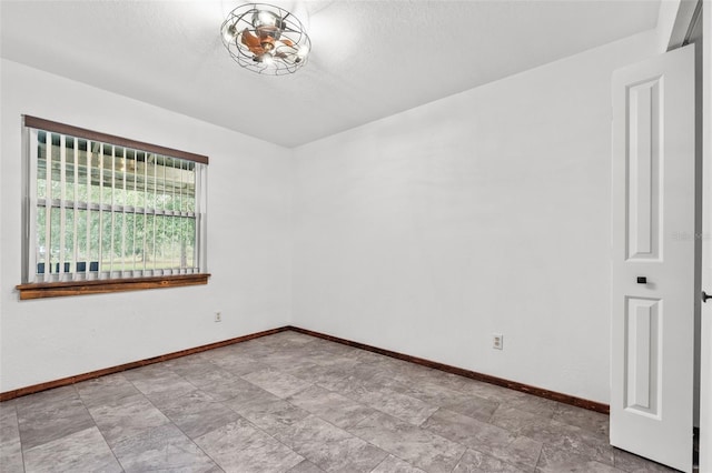 965 Keen Rd, Frostproof, FL 33843 - unfurnished room featuring a textured ceiling and baseboards