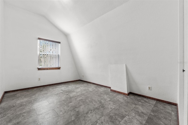 965 Keen Rd, Frostproof, FL 33843 - spare room with lofted ceiling and baseboards