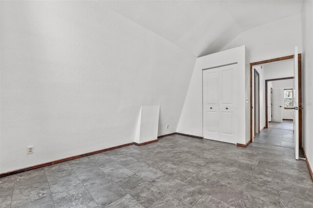 965 Keen Rd, Frostproof, FL 33843 - additional living space with baseboards and vaulted ceiling