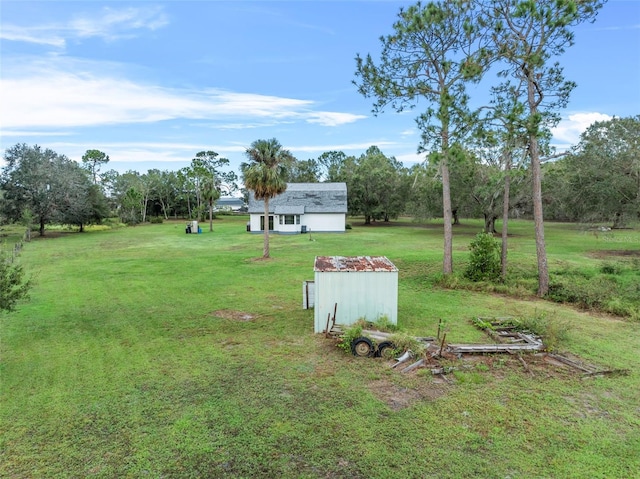 965 Keen Rd, Frostproof, FL 33843 - view of grassy yard with an outdoor structure and view of scattered trees