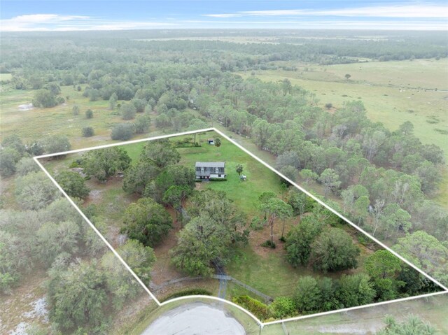 965 Keen Rd, Frostproof, FL 33843 - aerial overview of property's location with property boundaries highlighted, a forest, and rural landscape