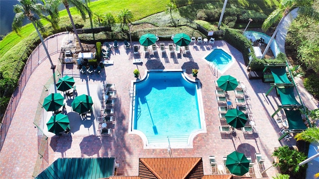 view of swimming pool with a patio area