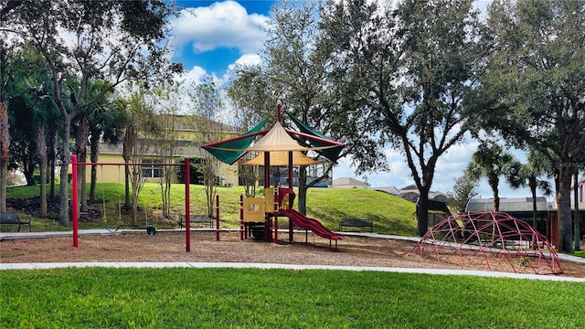 view of play area with a yard