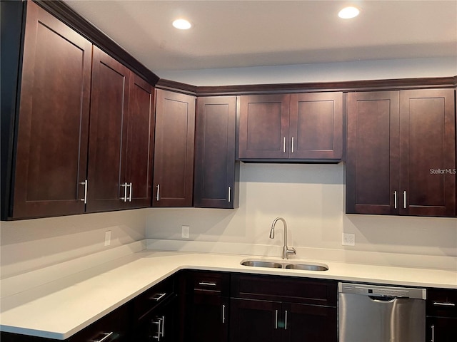 kitchen with sink, dishwasher, and dark brown cabinetry