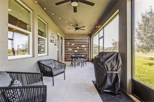 sunroom / solarium with ceiling fan