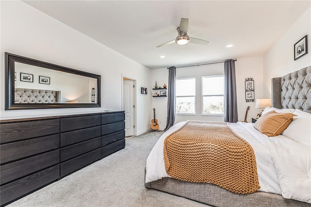 carpeted bedroom featuring ceiling fan