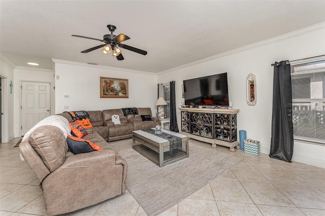 living room with ornamental molding, ceiling fan, and light tile patterned floors