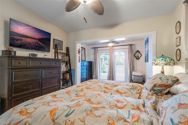 bedroom featuring ceiling fan and access to exterior