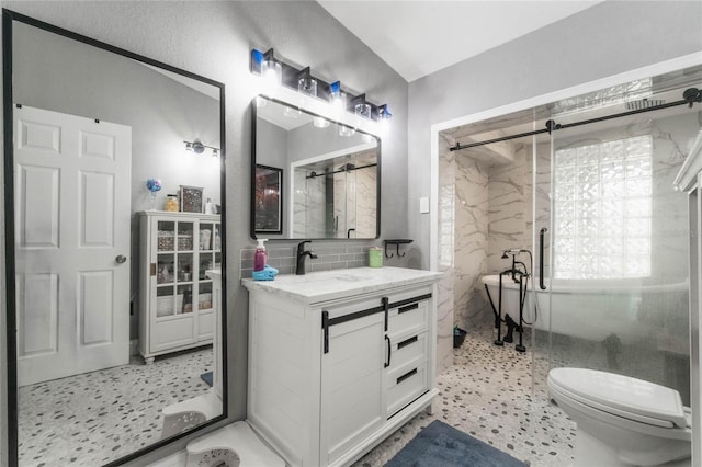 bathroom featuring toilet, vanity, an enclosed shower, and tasteful backsplash