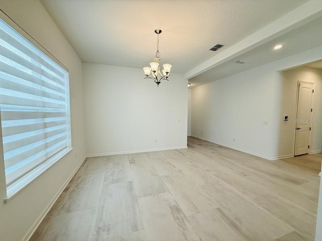 unfurnished room with light wood finished floors, baseboards, visible vents, a chandelier, and recessed lighting