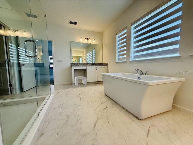 bathroom with marble finish floor, visible vents, vanity, and baseboards