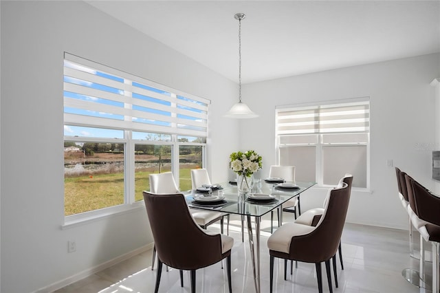 dining space with baseboards