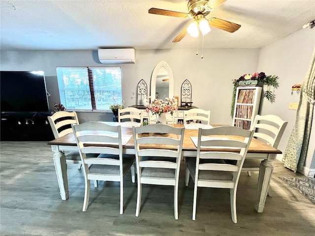 dining area with a wall mounted air conditioner, a textured ceiling, carpet, and ceiling fan