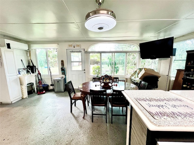 dining space with a wall unit AC