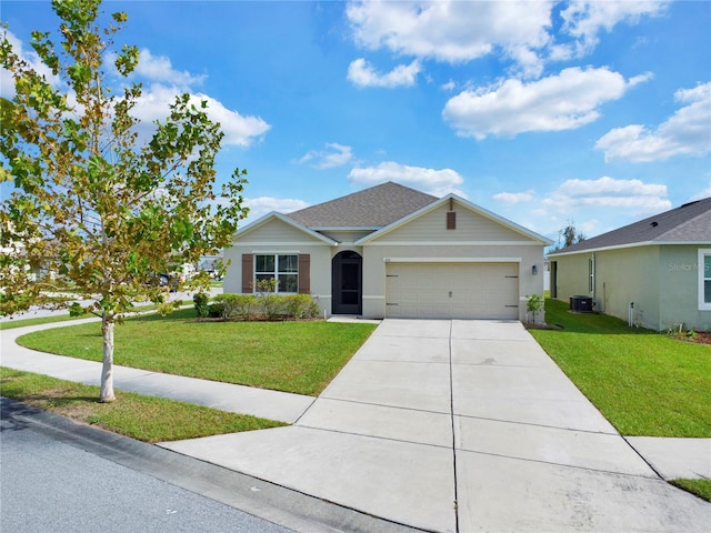 single story home with a front yard, cooling unit, and a garage