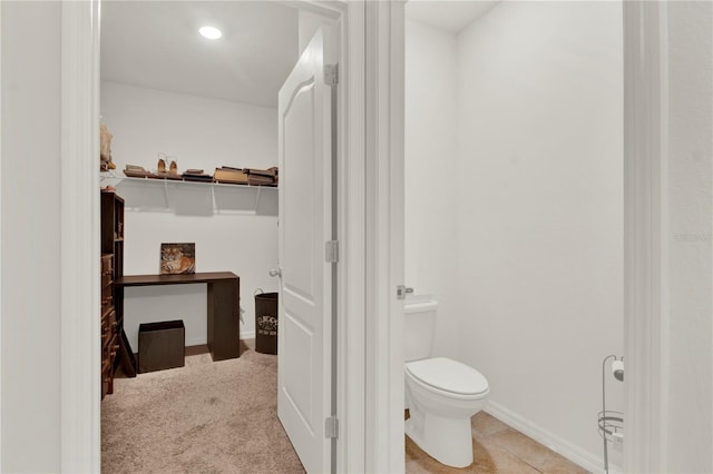 bathroom featuring toilet