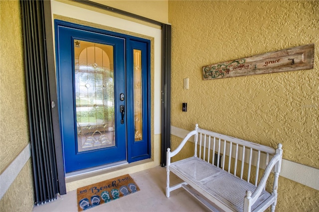 39 Tee View Pl, Rotonda West, FL 33947 - property entrance featuring stucco siding