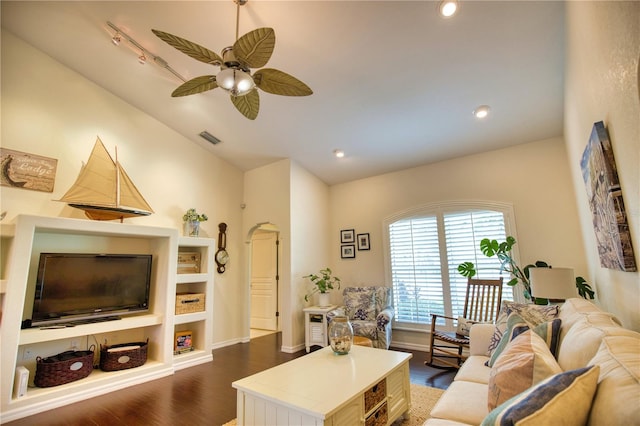 living room with lofted ceiling, ceiling fan, and dark hardwood / wood-style flooring