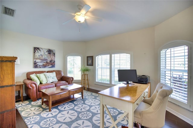 39 Tee View Pl, Rotonda West, FL 33947 - home office featuring a ceiling fan, wood finished floors, and baseboards