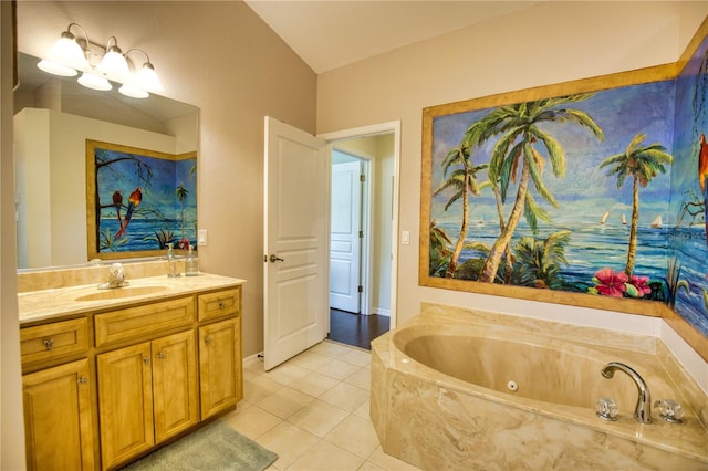 bathroom featuring vanity, tile patterned floors, and tiled tub