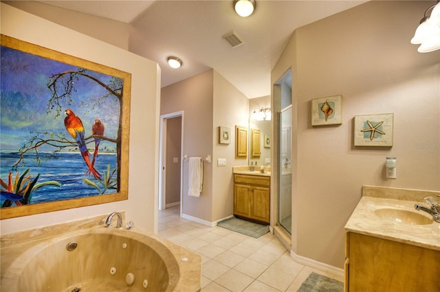 39 Tee View Pl, Rotonda West, FL 33947 - full bathroom featuring vanity, tile patterned floors, a jetted tub, a shower stall, and baseboards