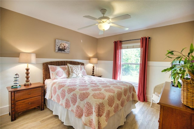 bedroom featuring ceiling fan and light hardwood / wood-style floors