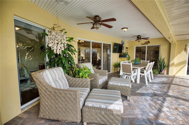 view of patio with ceiling fan