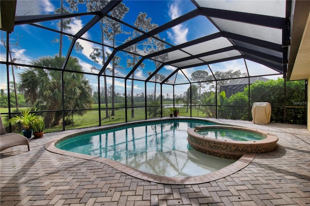 39 Tee View Pl, Rotonda West, FL 33947 - view of swimming pool with a pool with connected hot tub, a patio area, and a lanai