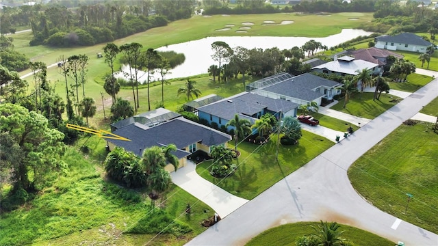 39 Tee View Pl, Rotonda West, FL 33947 - aerial view of residential area featuring a nearby body of water and a golf club