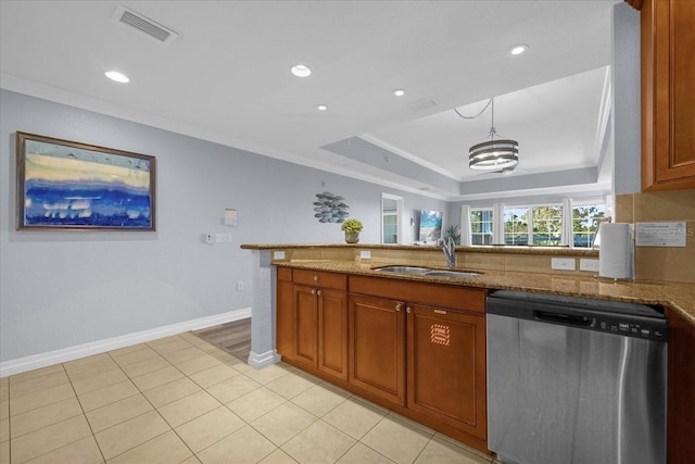 kitchen featuring dishwasher, sink, light stone counters, crown molding, and pendant lighting