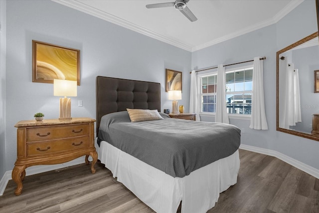 bedroom with wood-type flooring, ceiling fan, and crown molding