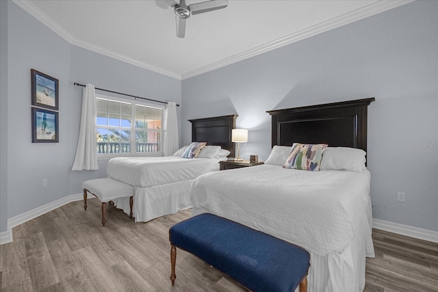 bedroom with ceiling fan, wood-type flooring, and ornamental molding