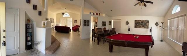 recreation room featuring high vaulted ceiling, ceiling fan, and billiards