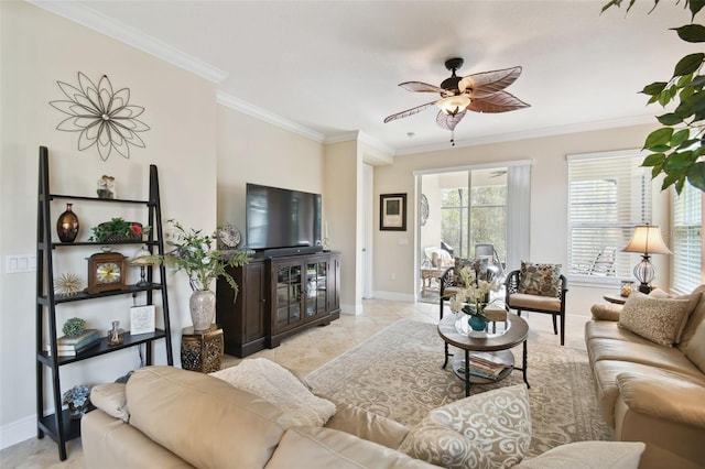 tiled living room with ceiling fan and crown molding