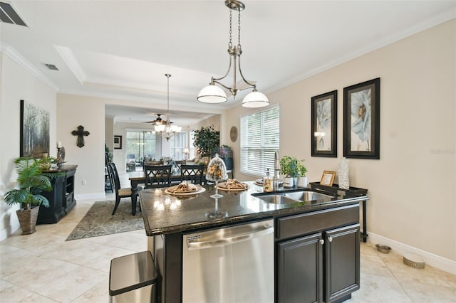 kitchen with sink, dark stone countertops, stainless steel dishwasher, ceiling fan, and a kitchen island with sink