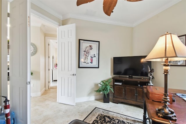 tiled living room with ceiling fan and crown molding