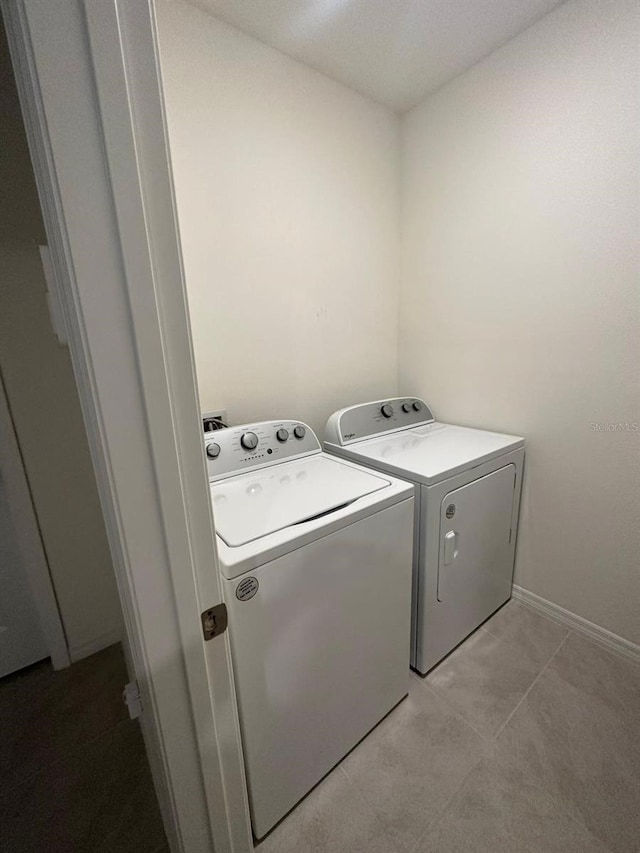 washroom with separate washer and dryer