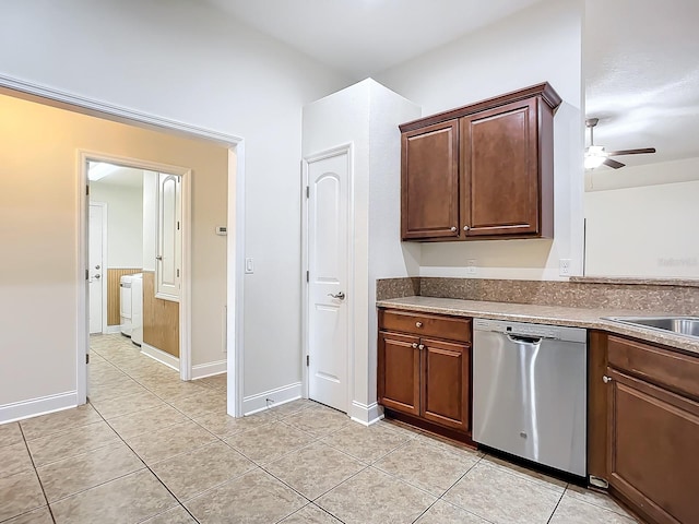 kitchen with light tile patterned floors, sink, dishwasher, and ceiling fan