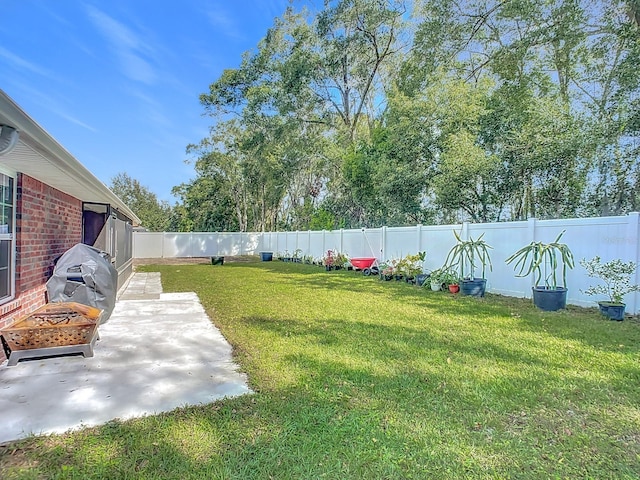 view of yard with a patio area