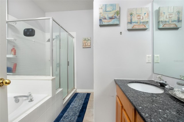 bathroom featuring vanity, shower with separate bathtub, and tile patterned floors