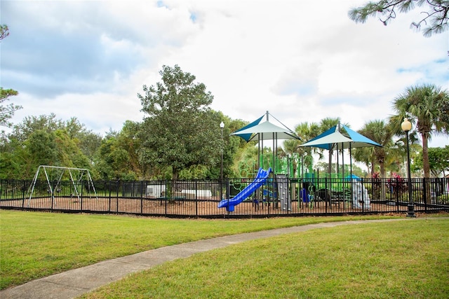 view of jungle gym with a lawn