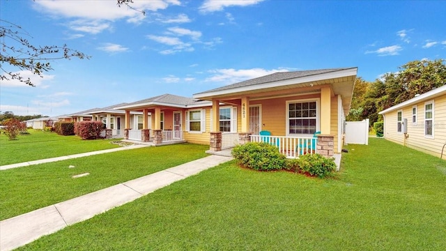 view of front of house with a front lawn and covered porch