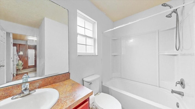 full bathroom featuring vanity, toilet, and shower / tub combination