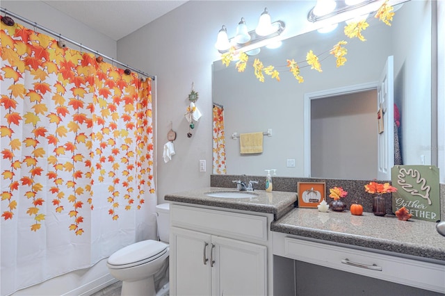 full bathroom featuring vanity, shower / bath combo, and toilet