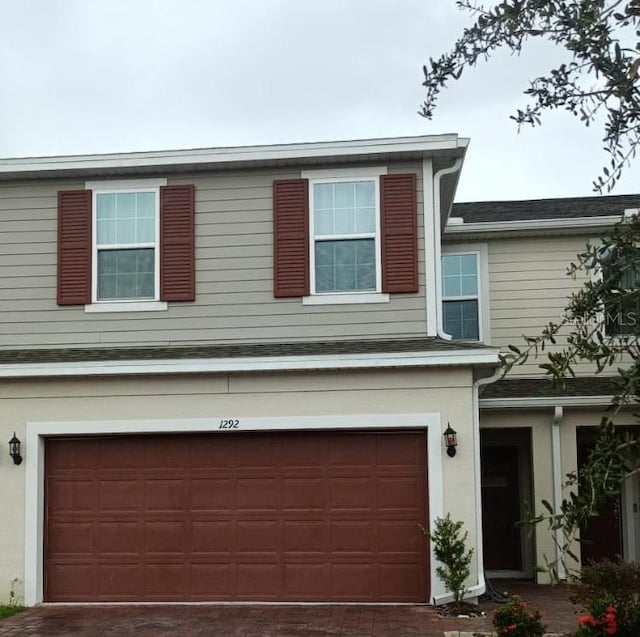 view of front of home featuring a garage