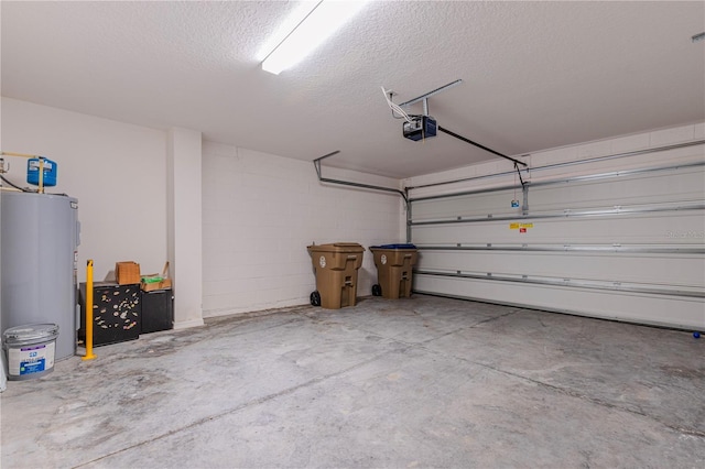 garage featuring a garage door opener and electric water heater