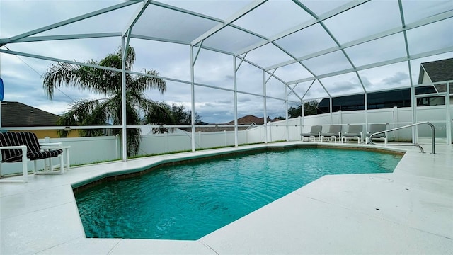 view of pool featuring a lanai and a patio area