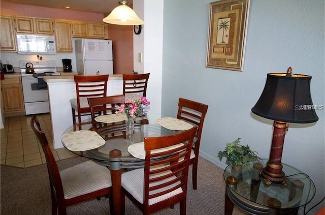 view of tiled dining area