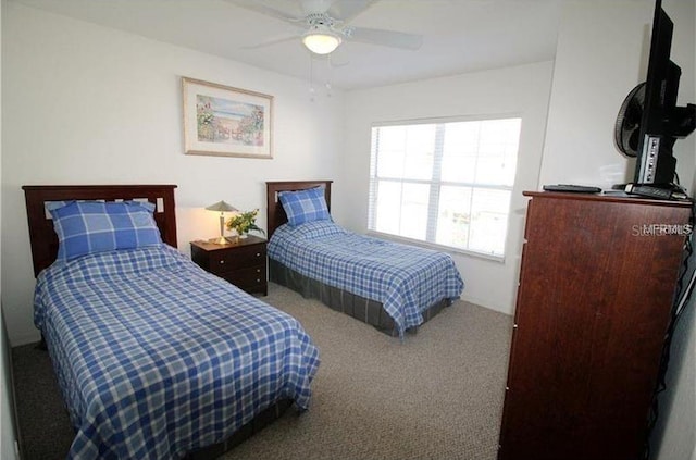 bedroom with carpet and ceiling fan